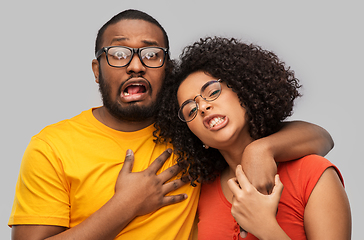 Image showing happy african american couple in glasses hugging