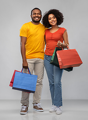 Image showing happy african american couple with shopping bags