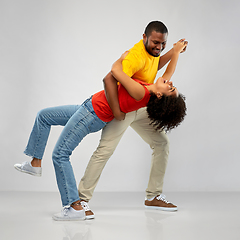 Image showing happy smiling african american couple dancing