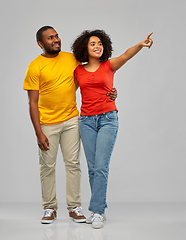 Image showing african american couple pointing to something