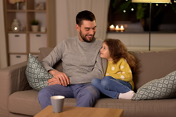 Image showing happy father and little daughter at home at night