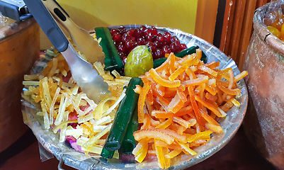 Image showing Appetizing candied fruit on a large plate