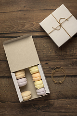 Image showing Flat lay of marshmallows in a cardboard boxes in food delivery