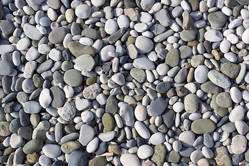 Image showing Background of seaside pebbles on coast of sea resort