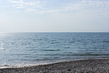 Image showing Deserted pebble beach on the Black Sea on summer vacation resort