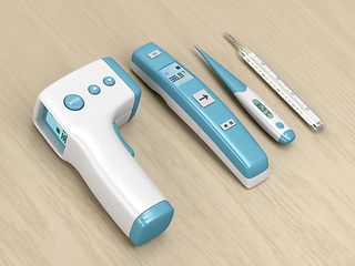 Image showing Four different medical thermometers
