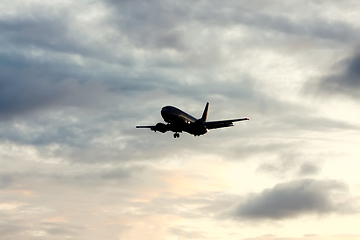 Image showing air plane in sunset sky