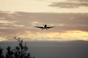 Image showing air plane in sunset sky