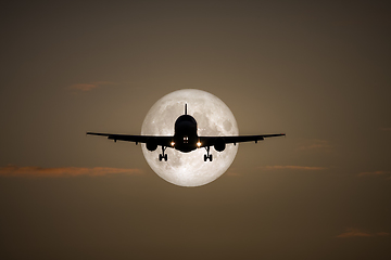 Image showing air plane full moon