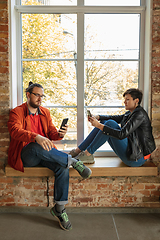 Image showing Happy young man and woman sharing in social media