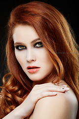 Image showing girl with beautiful long red hair