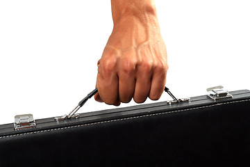 Image showing Hand with a black suitcase. Isolated on white 