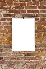 Image showing Mock up blank picture or sheet on the brick wall background