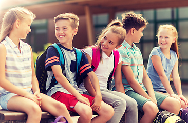 Image showing group of happy elementary school students talking