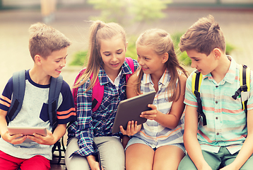 Image showing group of happy elementary school students talking