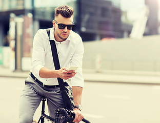 Image showing man with bicycle and smartphone on city street