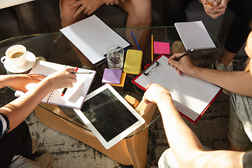 Image showing Group of young caucasian office workers have creative meeting to discuss new ideas