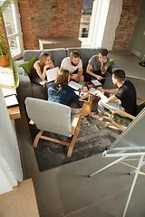 Image showing Group of young caucasian office workers have creative meeting to discuss new ideas