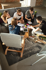 Image showing Group of young caucasian office workers have creative meeting to discuss new ideas