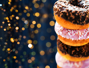 Image showing close up of glazed donuts with sprinkles