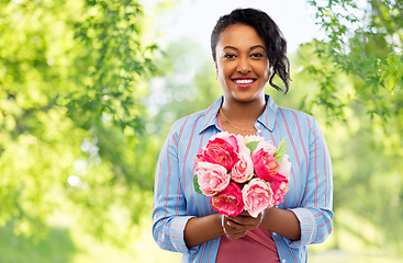 Image showing happy african american woman with bunch of flowers