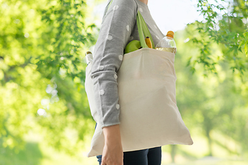 Image showing woman with reusable canvas bag for food shopping