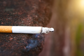 Image showing smoking cigarette side view