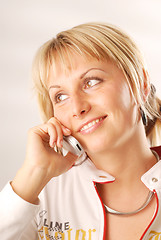 Image showing A woman calling from her cellphone