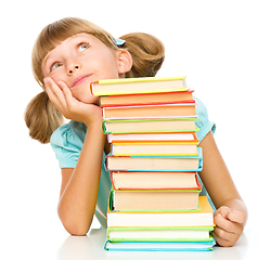 Image showing Little girl with books