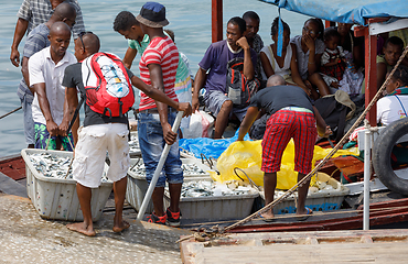 Image showing Malagasy peoples loading ship in Nosy Be, Madagascar