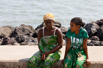 Image showing Malagasy woman waiting for transport ship, Nosy Be, Madagascar