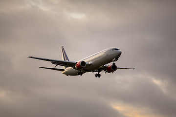 Image showing air plane in sunset sky