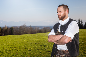 Image showing bavarian tradition man in the grass