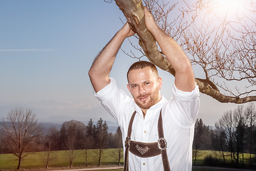 Image showing bavarian tradition man in the grass