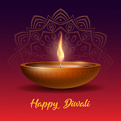 Image showing Burning diya on Happy Diwali Holiday on dark