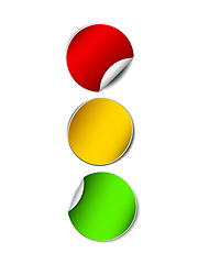 Image showing Paper traffic lights. Red, yellow and green stickers