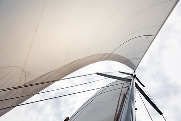 Image showing Sailing boat sails background