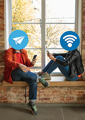 Image showing Creative millenial people connecting and sharing social media. Modern UI icons as heads