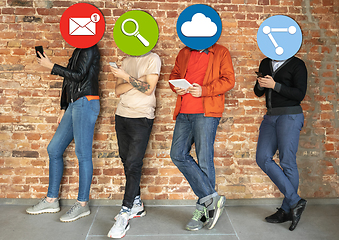 Image showing Creative millenial people connecting and sharing social media. Modern UI icons as heads