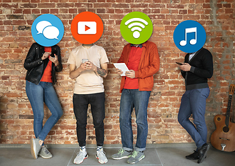 Image showing Creative millenial people connecting and sharing social media. Modern UI icons as heads