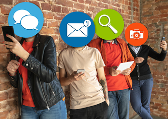 Image showing Creative millenial people connecting and sharing social media. Modern UI icons as heads