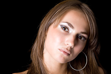 Image showing Portrait of the young woman. Isolated on black background