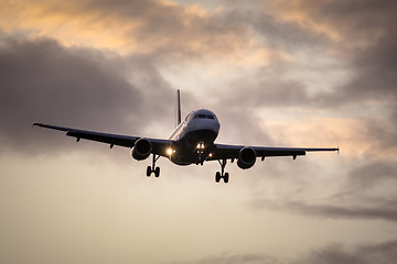 Image showing air plane in sunset sky