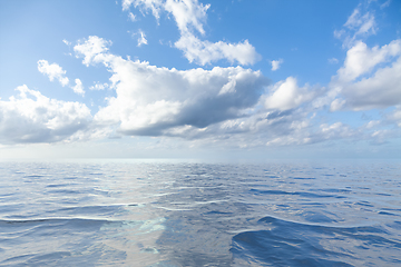 Image showing blue sky with white clouds over the sea