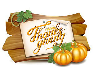 Image showing Thanksgiving card with wooden banner and pumpkins with leaves