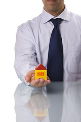 Image showing businessman selling a house