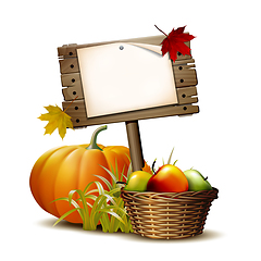 Image showing Old Wooden banner with Orange pumpkin, Autumnal leaves and basket full ripe apples