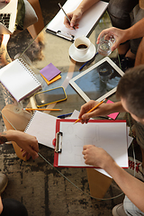 Image showing Group of young caucasian office workers have creative meeting to discuss new ideas