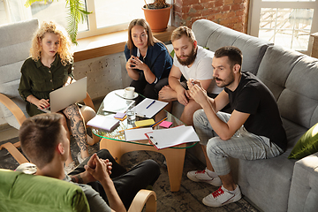 Image showing Group of young caucasian office workers have creative meeting to discuss new ideas