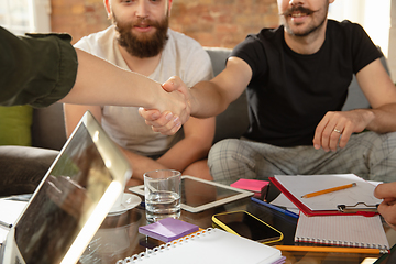 Image showing Group of young caucasian office workers have creative meeting to discuss new ideas